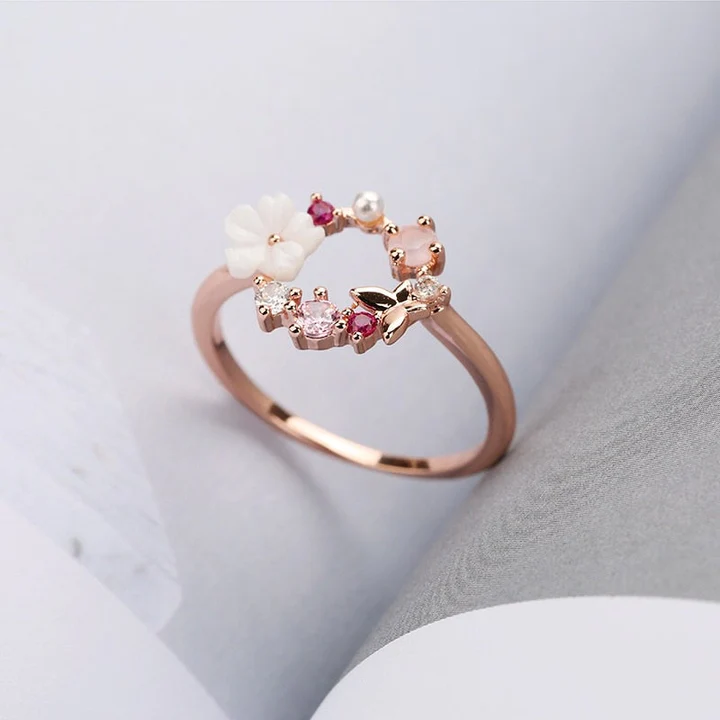Floral ring with pink cubic zirconia in gold