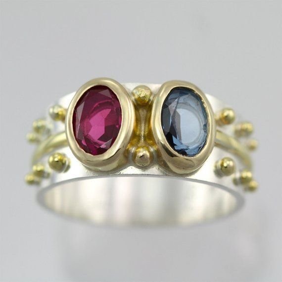 Vintage ring with blue and red crystal