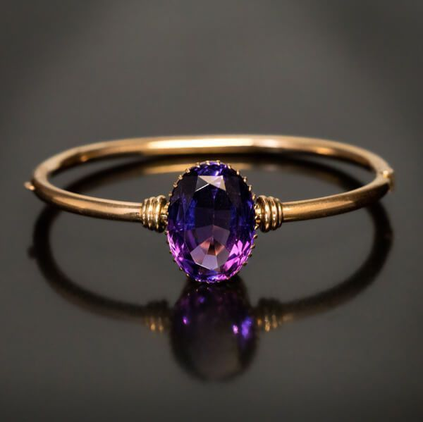 Ring with purple crystal in vintage gold
