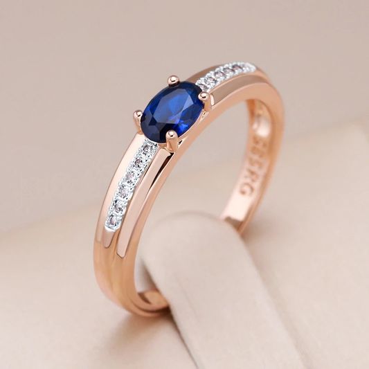 Ring with blue crystal in gold