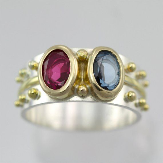 Vintage ring with blue and red crystal