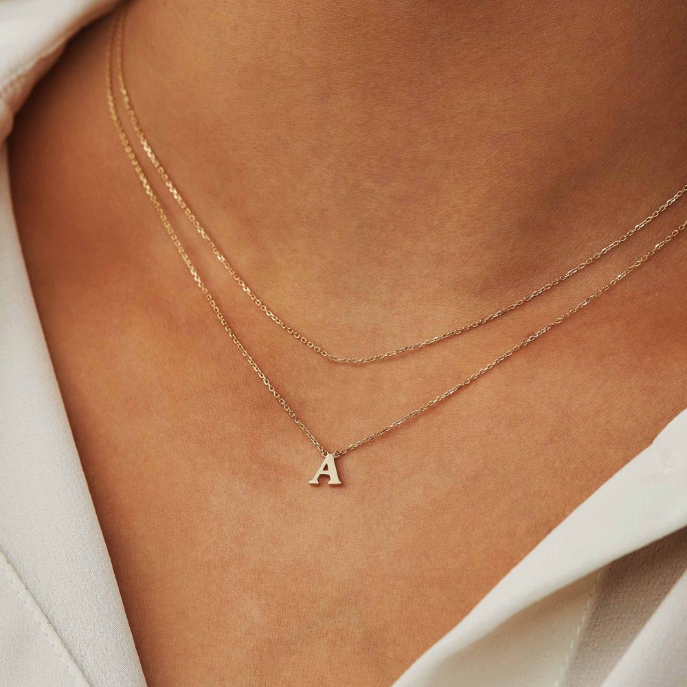 Amélie Jardin - subtiele initialen collier (a-z)