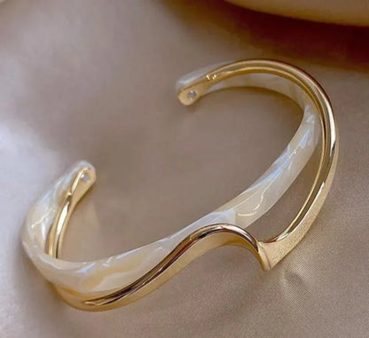 White opal elegant golden bracelet